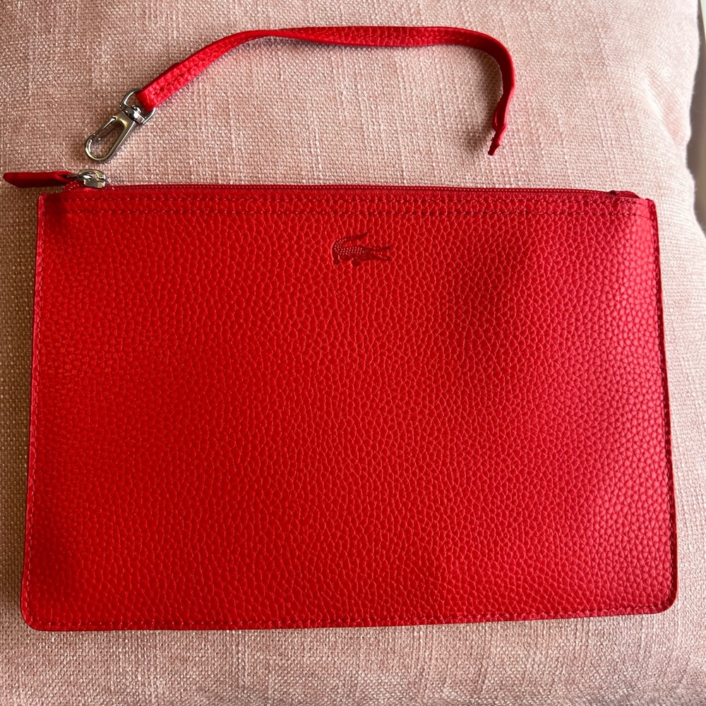 New Lacoste clutch- wristlet red colour.